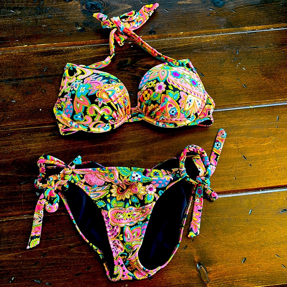 Victoria’s Secret swim with a top 34C and bottom size small.